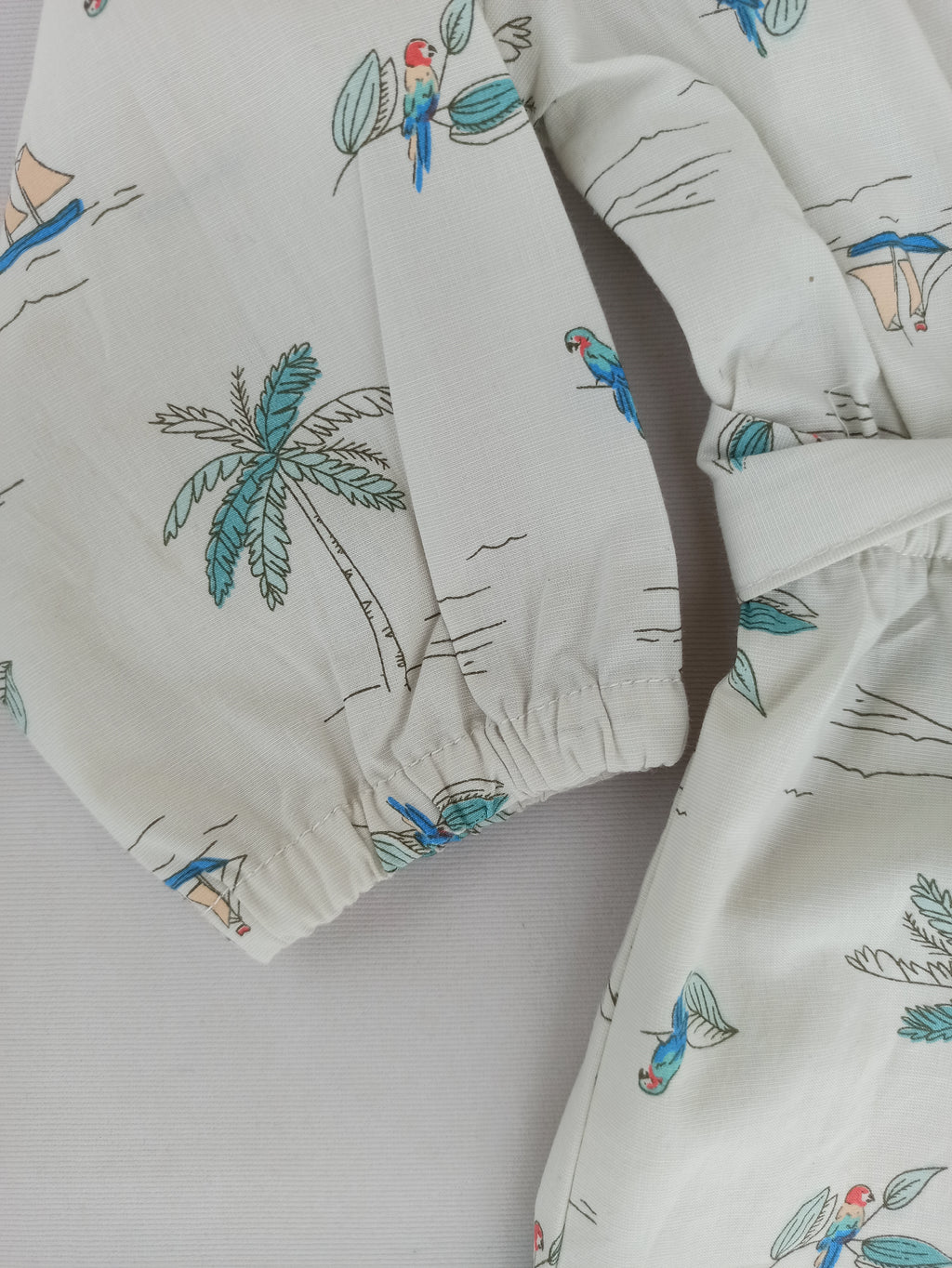 بیبی ٹاس ملٹی پرنٹڈ جمپ سوٹ